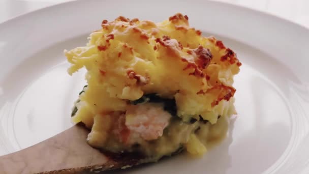 Comfort Food Traditional English Cuisine Portion Fish Pie Served White — Stock Video