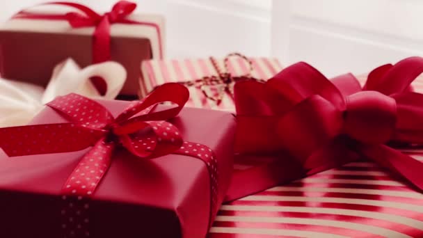 Holiday Gifts Presents Classic Red Pink Gift Boxes Wrapped Luxury — Wideo stockowe