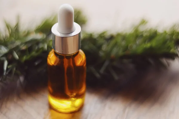 Organic oil serum bottle, beauty and skincare product.
