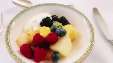 Breakfast, fruit salad in the luxury hotel in England, United Kingdom.