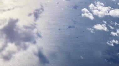 Glorious dreamy sky over aerial view of the English channel in England, United Kingdom, sea, ship, sun rays and clouds at sunrise or sunset in pastel colours as video background.