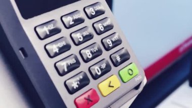 Paying with self checkout, self-service payment at the supermarket.