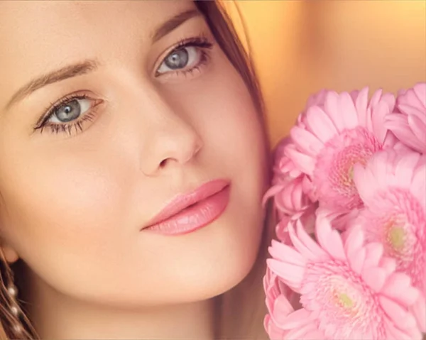 美しさ ブライダルメイク 化粧品 フェイススキンケアの肖像画としてピンクの花束を持つ美しい女性 ストック写真