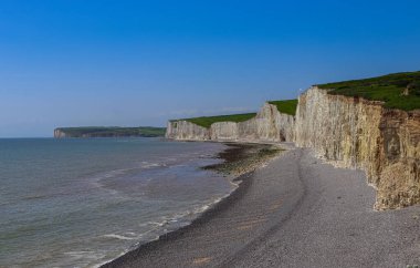 Seven Sisters chalk cliffs on the East Sussex coastline by the English Channel, representing natural beauty and travel destination. East Sussex, England