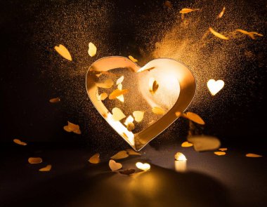 Golden hearts burst forth in an enchanting celebration of love. A radiant glow fills the space as shimmering pieces dance through the air, capturing the essence of Valentine's Day magic. clipart