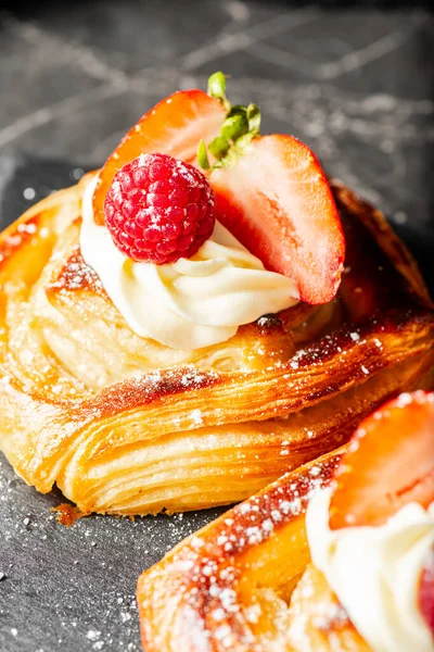 stock image Delicious flaky fresh baked Danish Pastry with Chantilly cream and fresh fruit.