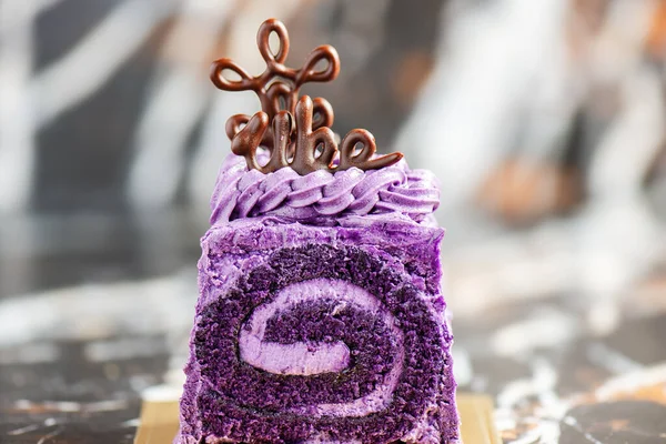 Freshly Baked Decorated Ube Swiss Roll Royalty Free Stock Photos