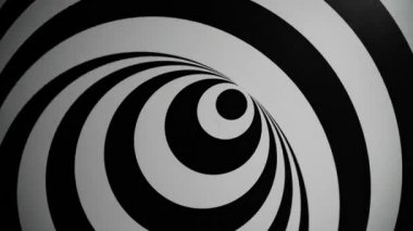 Kendileri üzerinde dönen eş merkezli çemberler. Optik illüzyon ve spiraller. Optik hipnoz, dairesel desen. Siyah ve beyaz çizgiler renkli ahşap bir mekanizma üzerinde hareket eder. Psikedelik deneyim.