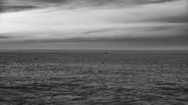 black and white photo of a beautiful sea