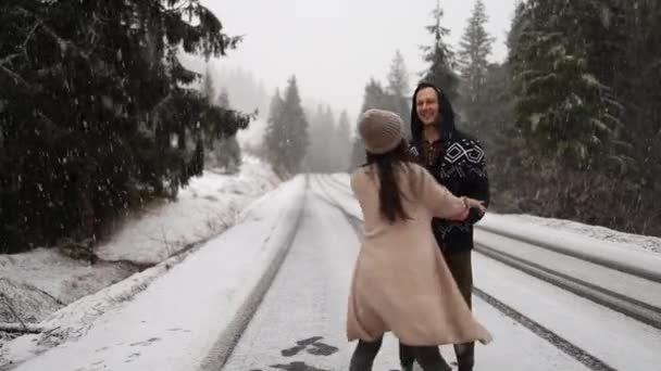 Young Multiethnic Couple Warm Sweaters Date Winter Forest Christmas Vacation — Wideo stockowe