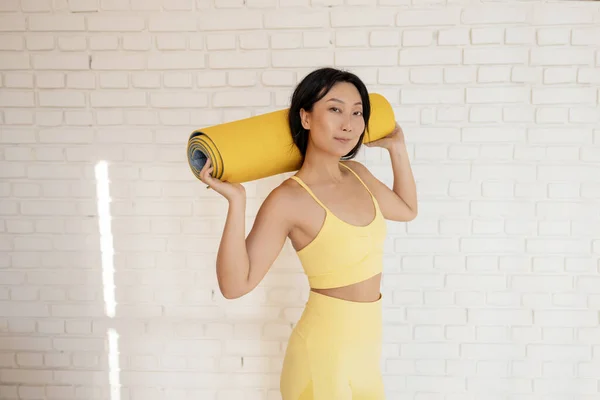 Happy Attractive Young Asian Woman Holds Hands Yellow Yoga Fitness — Stock Fotó