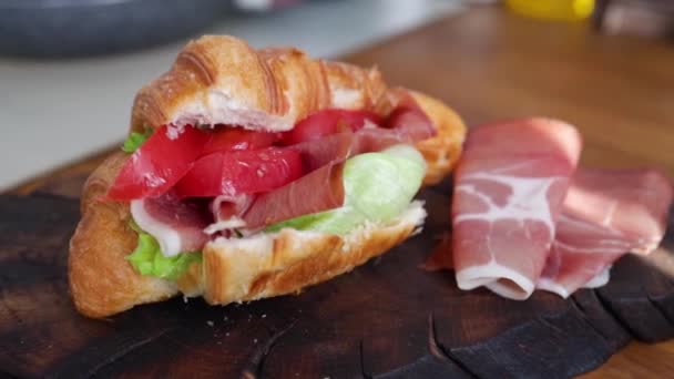 Sliced Prosciutto Jamon Meat Croissant Wooden Board Kitchen — Stock Video