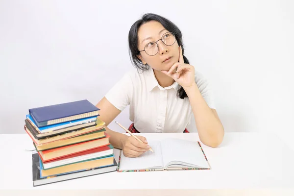 Student Preparing College Test Exam Reading Book Studying Textbook Writing — Stock Photo, Image