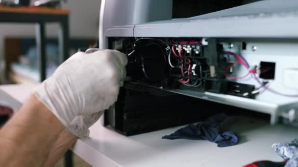 Printer Repair Technician Male Handyman Inspects Printer Starting Repairs Service — Stock Video