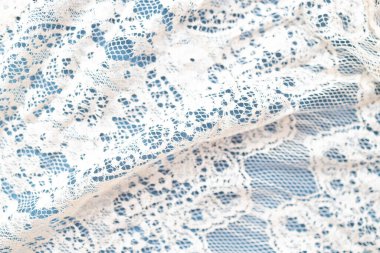 Dantel kumaş dokusu. Dantel kumaş dokusu arka planı. Beyaz dantel kumaş dokusunu kapat.