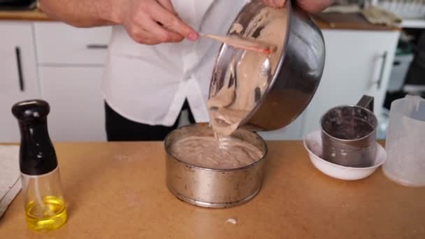 Man Pouring Mixture Cake Pan — Stock Video