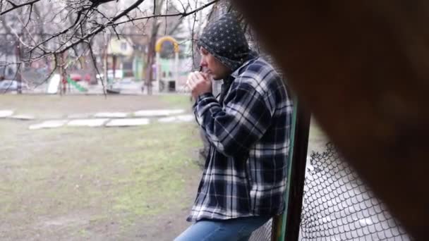 Young Man Lights Marijuana Boy Smoking Cigarette Influence Street Bad — Stock Video