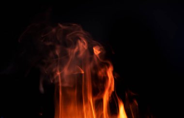 Ateş ısısı soyut dokulu arkaplanı yakıyor.