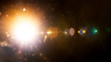 Soyut Doğal Güneş patlaması kolajı ya da siyah arkaplanda Uzak Yıldız