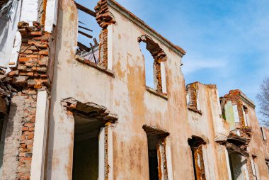 Post-war landscape. Destroyed building. War ruins. Destroyed city after the bombing. Dead city. Bombed buildings. Debris buildings. War destruction.