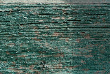 Eski yeşil ahşap tahtalardan yapılmış arkaplan resmi