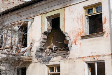 Post-war landscape. Destroyed building. War ruins. Destroyed city after the bombing. Dead city. Bombed buildings. Debris buildings. War destruction.