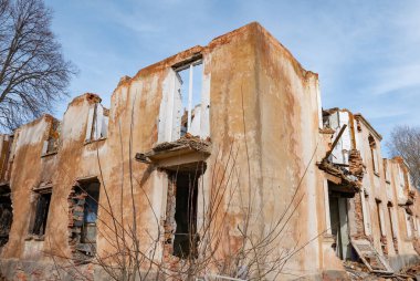 Post-war landscape. Destroyed building. War ruins. Destroyed city after the bombing. Dead city. Bombed buildings. Debris buildings. War destruction.
