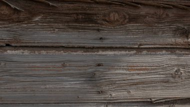 Kahverengi ahşap yapısı doğal ağaçtan geliyor. Tahta panelin güzel koyu bir deseni var, ahşap döşeme dokusu.