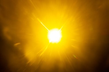 Siyah arkaplanda bulanık bir görüntü var.