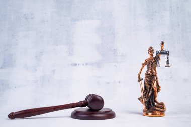 Law concept. Gavel and lady justice clipart