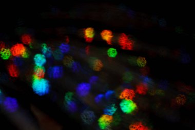 Noel arkaplanı. Bokeh odaklı ışıklar ve yıldızlarla şenlikli soyut arkaplan.