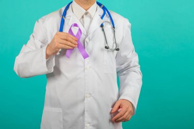 Male doctor holding a purple ribbon in her hands ADD,ADHD,Alzheimer Disease ,Arnold Chiari Malformation,Childhood Hemiplegia stroke, Epilepsy, Chronic Acute Pain,Crohns clipart