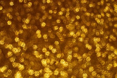 Noel arkaplanı. Bokeh odaklı ışıklar ve yıldızlarla şenlikli soyut arkaplan.