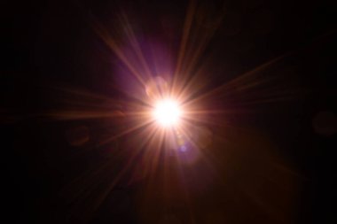 Siyah arkaplanda bulanık bir görüntü var.