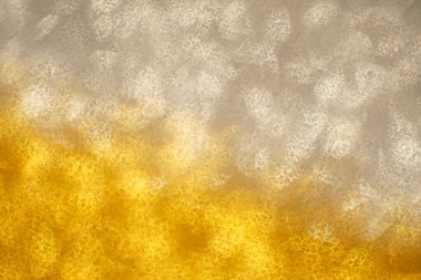 Noel arkaplanı. Bokeh odaklı ışıklar ve yıldızlarla şenlikli soyut arkaplan.