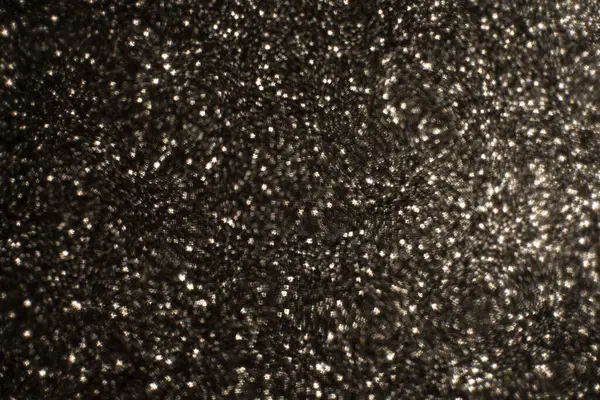 Noel arkaplanı. Bokeh odaklı ışıklar ve yıldızlarla şenlikli soyut arkaplan.