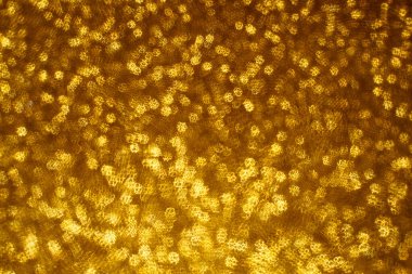 Noel arkaplanı. Bokeh odaklı ışıklar ve yıldızlarla şenlikli soyut arkaplan.