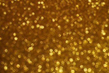 Noel arkaplanı. Bokeh odaklı ışıklar ve yıldızlarla şenlikli soyut arkaplan.