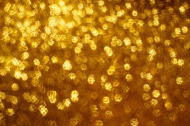 Noel arkaplanı. Bokeh odaklı ışıklar ve yıldızlarla şenlikli soyut arkaplan.