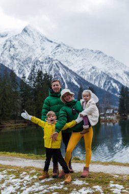 Family having the holiday at Gaillands lake in Chamonix, french 