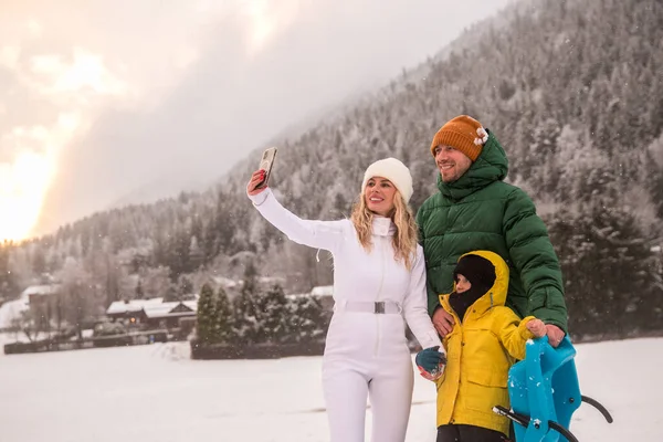 Alps France,family  take selfie on smartphone