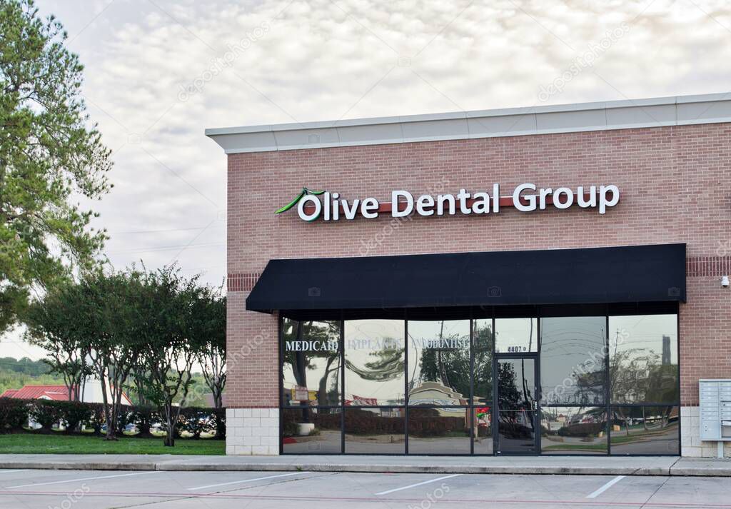 Houston, Texas USA 11-11-2022: Olive Dental Group building exterior in Houston, TX. Dentistry business established in 2019.