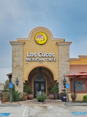 Houston, Texas USA 02-26-2023: Los Cucos Mexican Cafe storefront exterior in Humble, TX. Local tex-mex restaurant chain, outside front view.