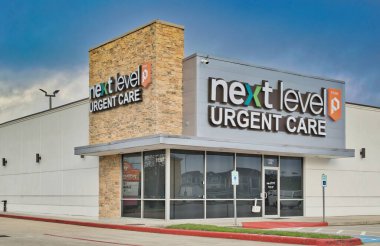 Humble, Texas USA 02-26-2023: Next Level Urgent Care clinic exterior. Medical treatment center business chain.