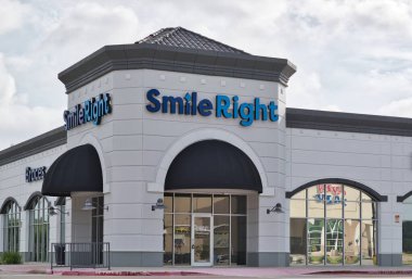 Houston, Texas USA 07-04-2023: Smile Right dental clinic exterior in Houston, TX. Local dentistry business storefront.