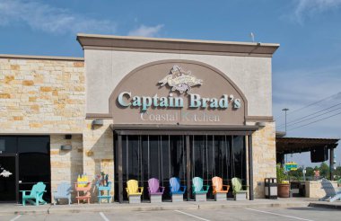 Tomball, Texas USA 04-07-2024: Captain Brad's Coastal Kitchen seafood restaurant storefront exterior, company business eating out, Tomball TX USA. clipart