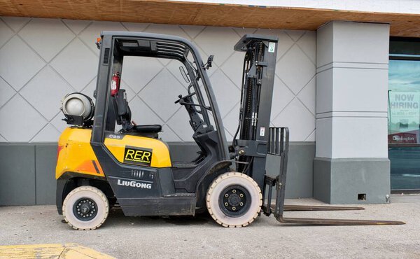 Houston, Texas USA 07-07-2024: LiuGong forklift vehicle building unmanned.