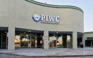 Houston, Texas USA 08-11-2024: PIWC Houston Metro Pentecostal church building exterior religion. clipart