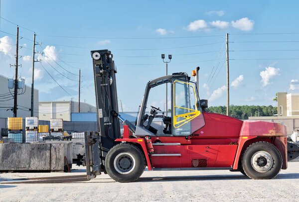 Houston, Texas USA 09-18-2022: Kalmar DCE160 forklift warehouse yard side view no people.