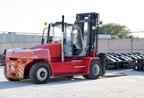 Houston, Texas USA 09-18-2022: Kalmar DCE160 forklift warehouse yard side view no people.